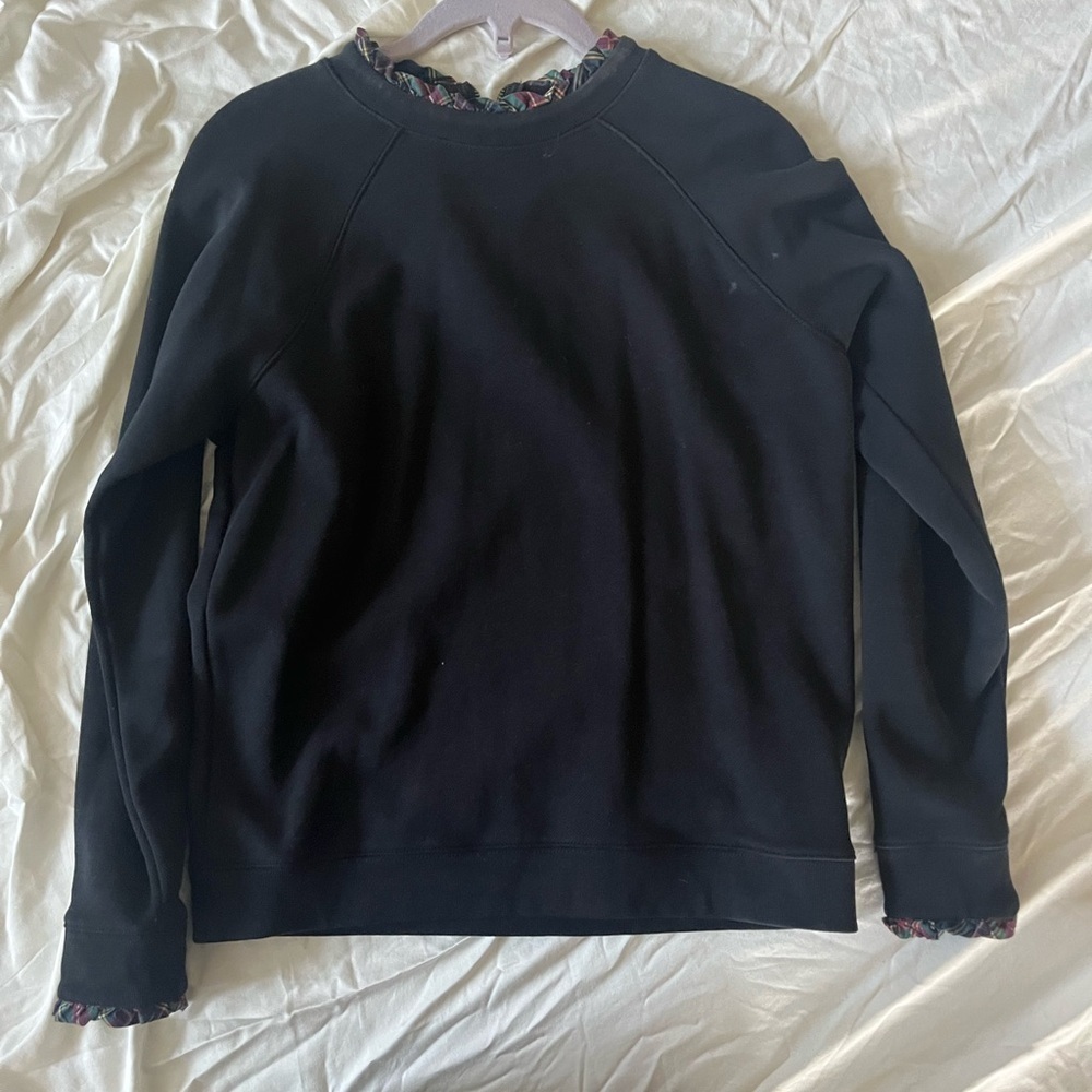 J. Crew Black Long Sleeve sweatshirt witb plaid holiday tartan trim.